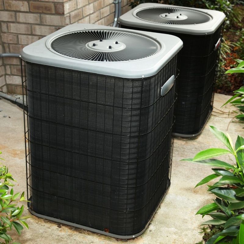 Outdoor air conditioning units beside a building